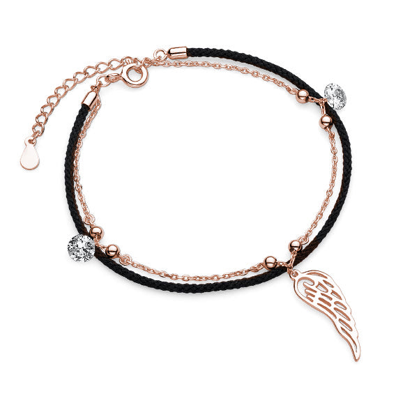 Rosa forgyldt armbånd med vinge 