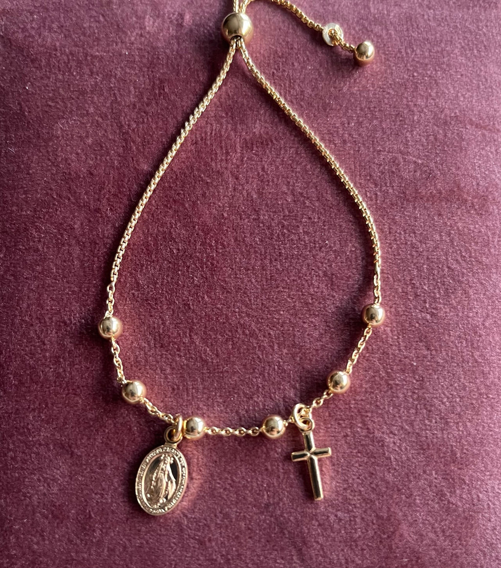  justerbart armbånd med kors